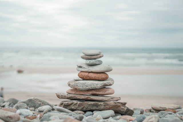 stacked pebbles on beach